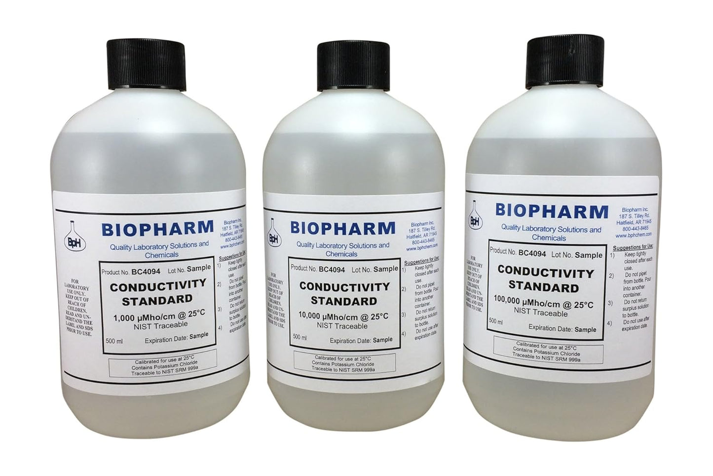 Three bottles of Biopharm conductivity standard solution on a white background