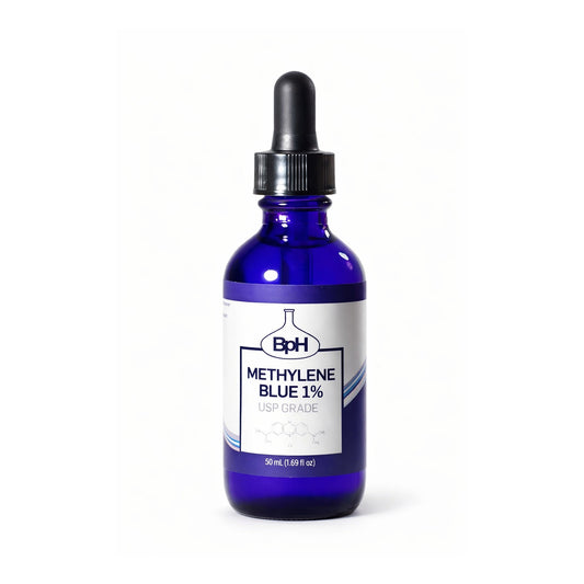 Blue bottle with dropper labeled 'Methylene Blue 1%' on a white background