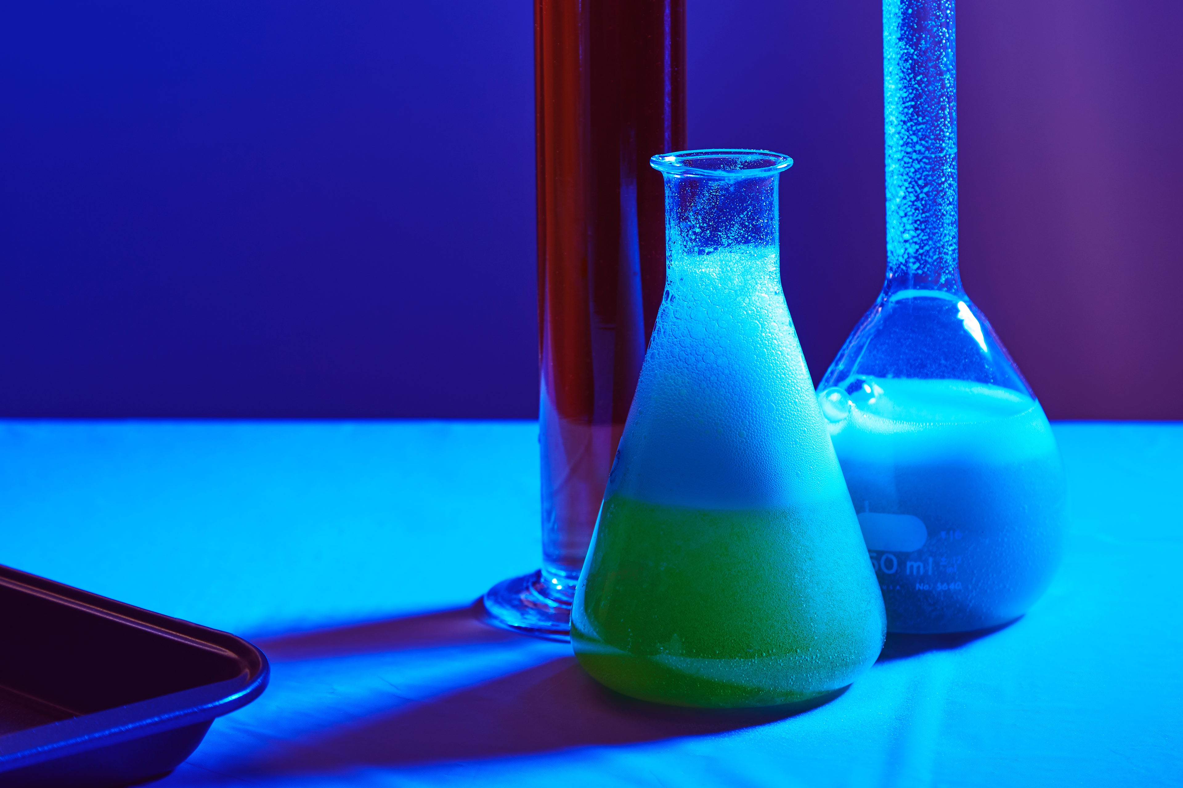 science beakers blue light